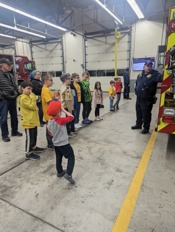 Scouts learning from member of the Butler City Fire Department