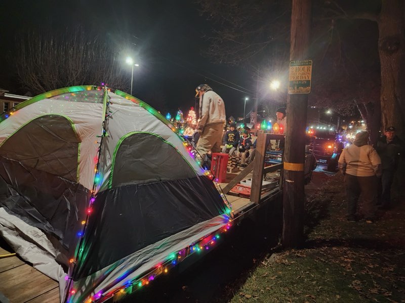 Scouts setting up their float for the Spirit of Christmas Parade